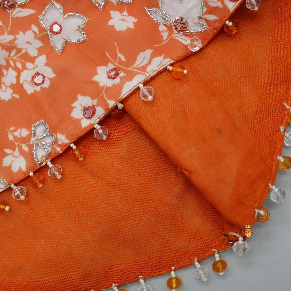 Pre Order: Sequin Embroidered One Shoulder Orange Top And Detachable Cape With Lehenga